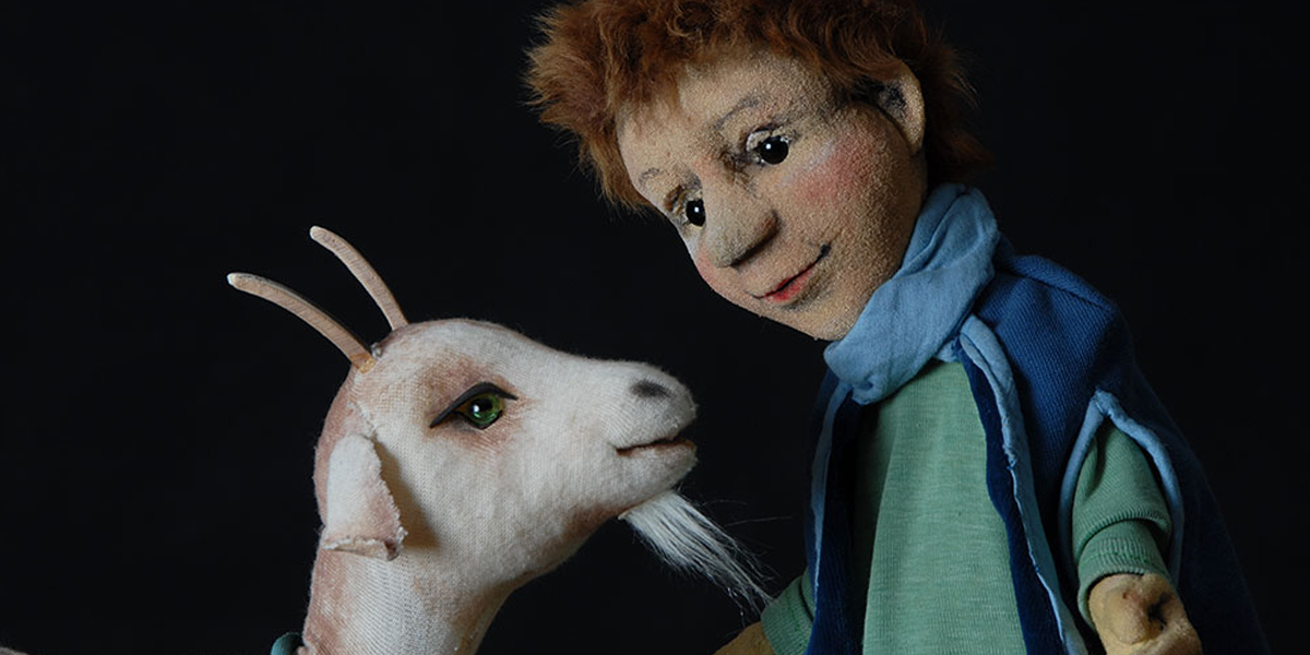 Bild von den Figuren "Simon" und "die Ziege"